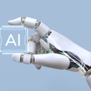 Obraz poglądowy - studia podyplomowe Sztuczna inteligencja (AI) w biznesie Obraz przedstawiający rękę robota trzymającą czip z napisem AI - sztuczna inteligencja