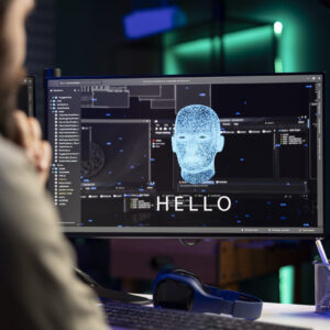 Obraz poglądowy - studia podyplomowe Sztuczna inteligencja (AI) w biznesie Obraz przedstawiający osobę przed ekranem komputera zajmującą się zagadnieniem sztucznej inteligencji - AI